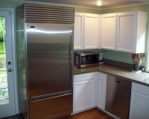 The before kitchen with white cabinets