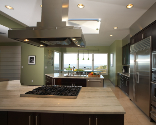 Marble Countertop With Stove and Stainless Steel Hood