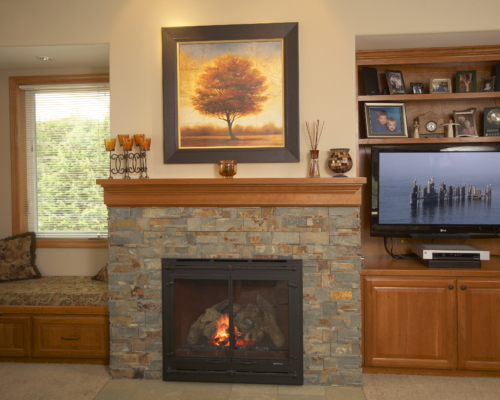 The New Fireplace With Built-in Bookshelf and Storage Bench