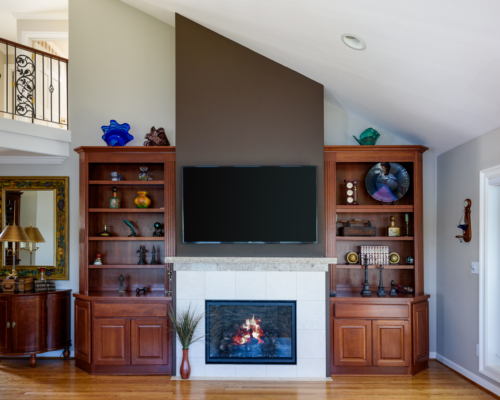 The new fireplace with existing bookcases