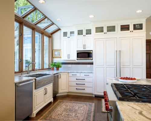 The new refrigerator with cabinet fronts.