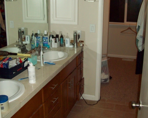 The previous master bathroom was dated and cluttered.