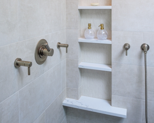 Large, four shelf niche in the shower.