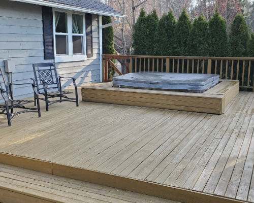 The failing hot tub took up most of the deck in the raised area before