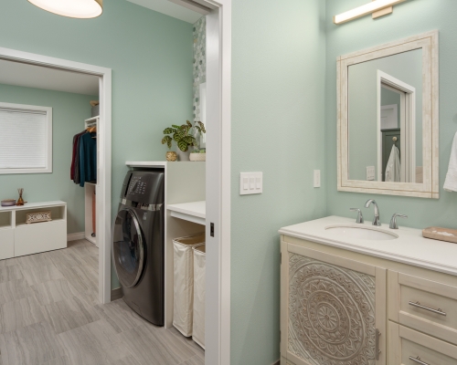Laundry Area Adjacent to Walk-in Closet